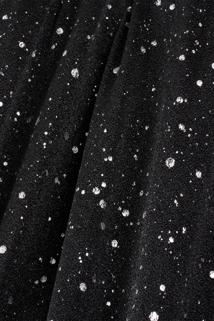 Stilla | Elegant sort glitrende kjole med mesh sene