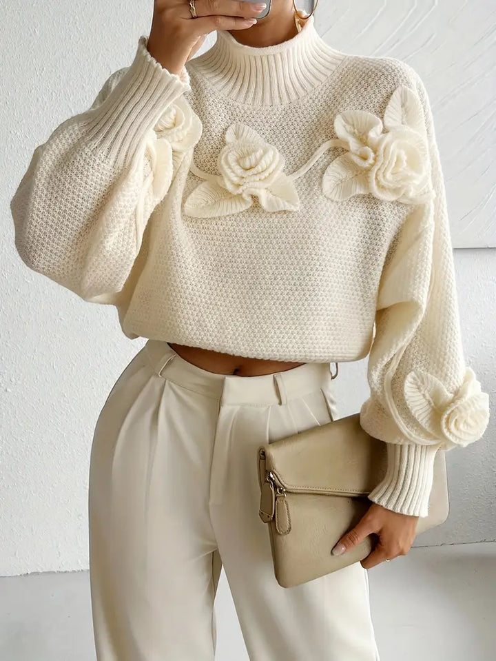 Stilla | Rullekrave strikbluse med blomster
