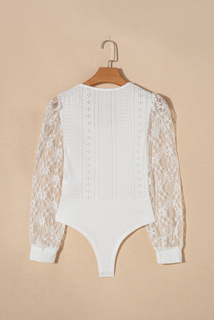 Stilla | Spids-langærmet-bodysuit