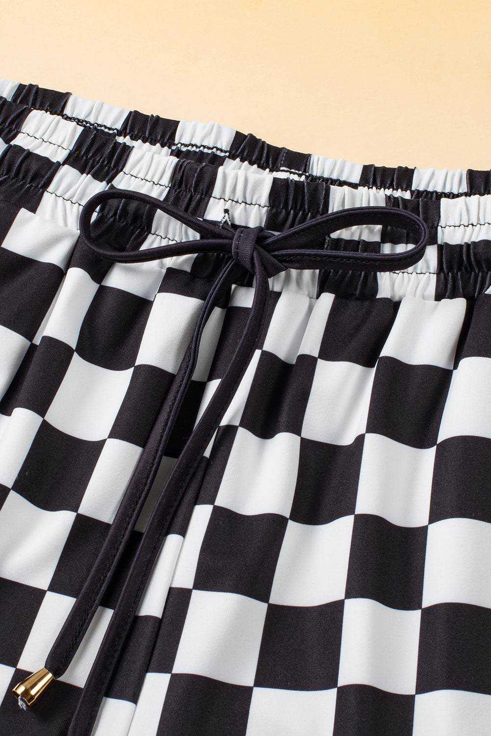 Stilla | Rutede shorts med lommer