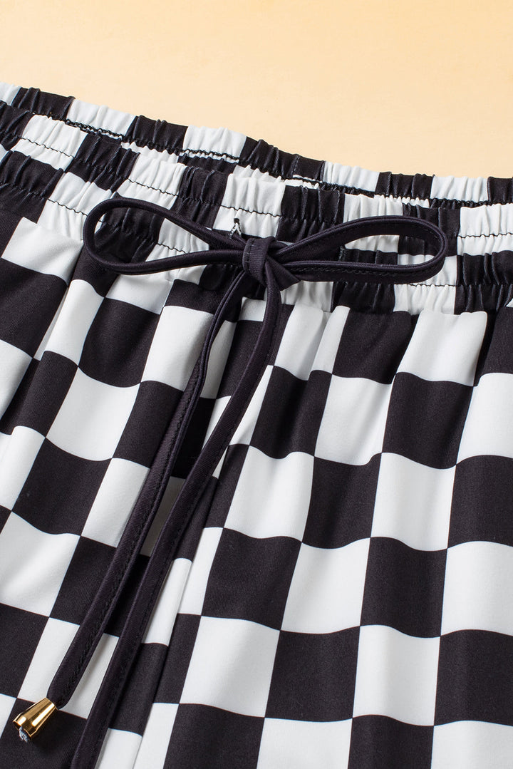 Stilla | Rutede shorts med lommer