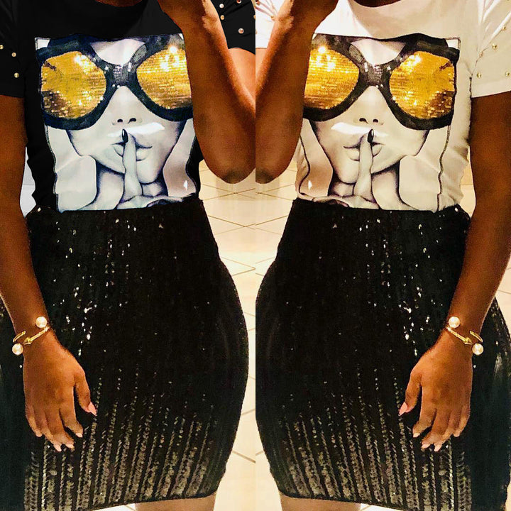 Dame Glamourøst T-Shirt med glimmermotiv og modiske detaljer Stilla