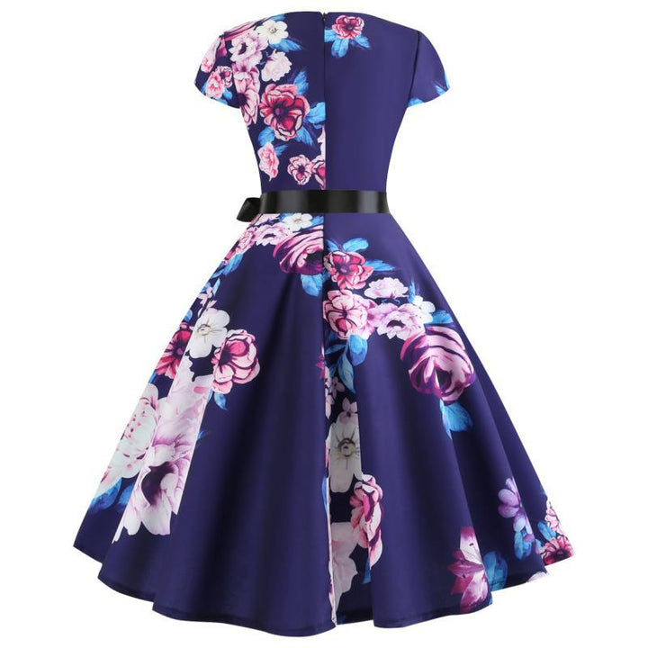 Kvinders Rund Hals Midi Kjole med Blomsterdesign og Udsvinget Nederdel Stilla