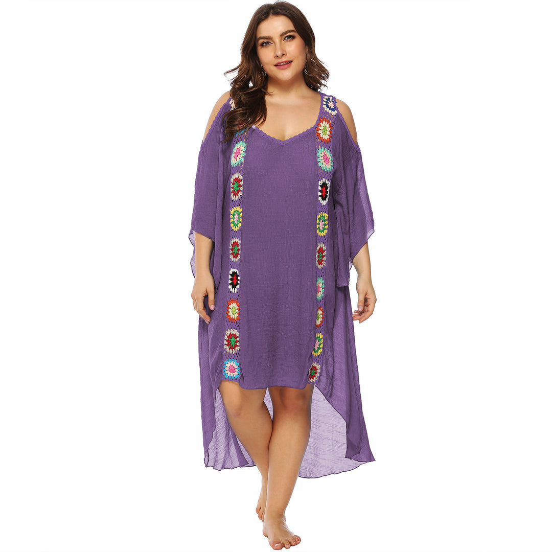 Damer med blomsterbroderi strandovertræk Skovae