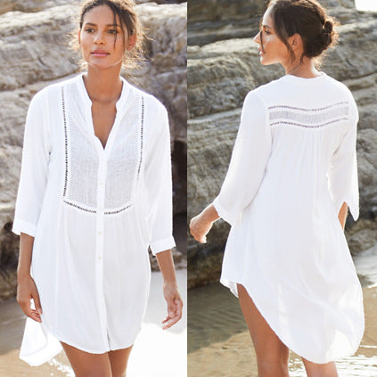 Dame Strandbluse med elegant knaplukning og fint broderi Stilla