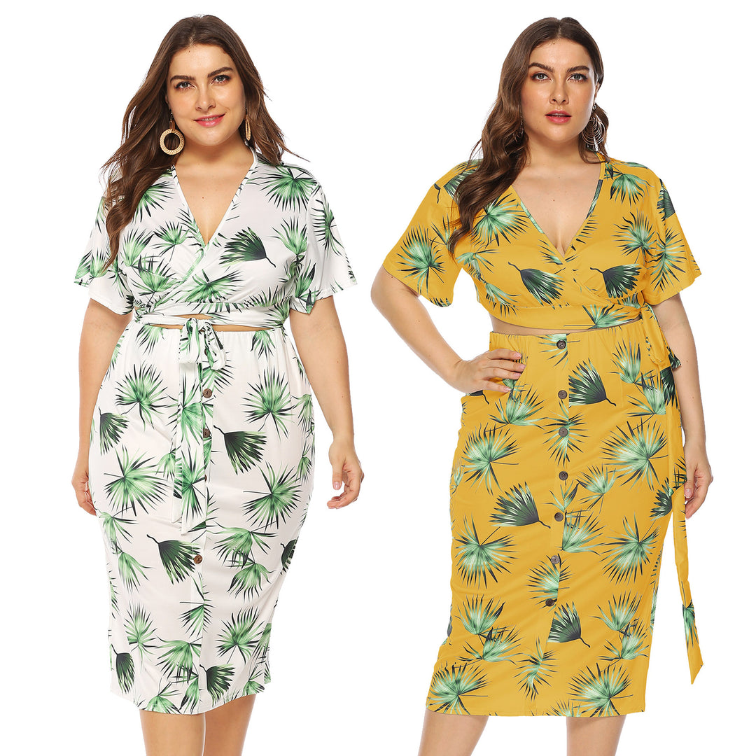 Dame elegant sommer-outfit med floral print og moderigtigt omslagdetail Skovae