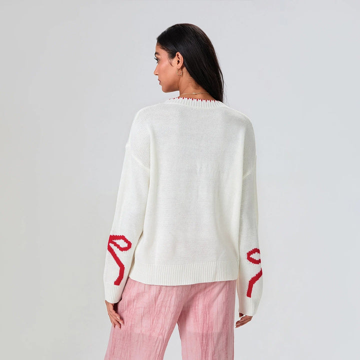 Stilla | Festlig strikpullover med sløjfe-design