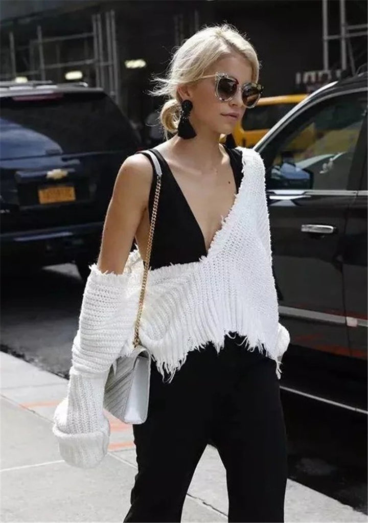 Dame trendy pullover med asymmetrisk snit og afslappede frynser Stilla