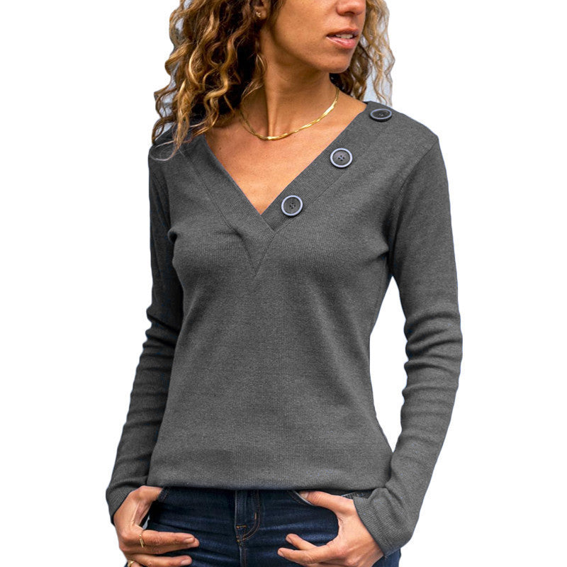 Dame V-hals pullover med dekorative knapper og fint strikmønster Stilla