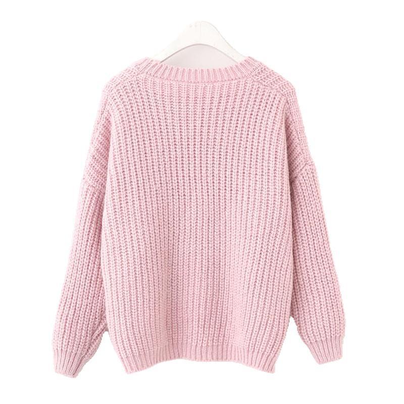 Kvinders casual strikket sweater med unikke knapdetaljer og oversized snit Stilla