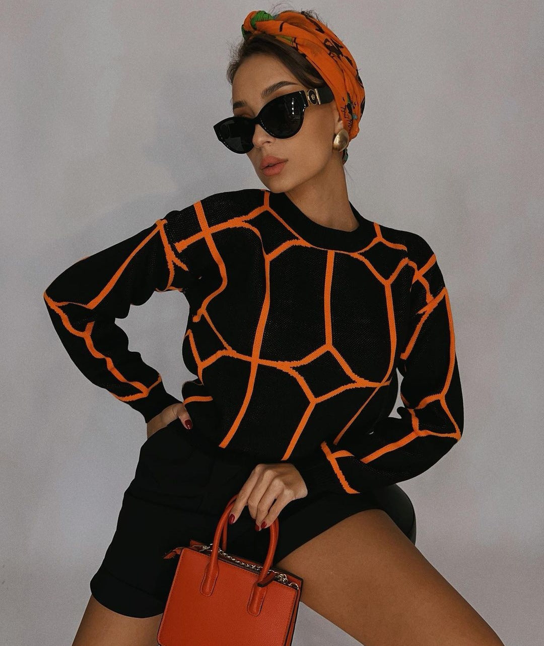 Stilla | Bluse i geometrisk farve-strik