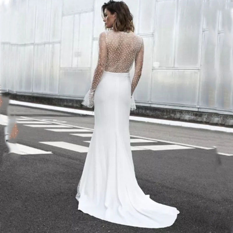 Dame bryllups kjole med transparente pufærmer og elegant slids Stilla