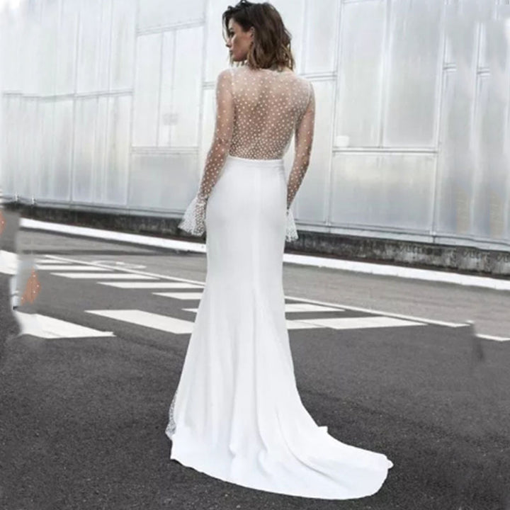 Dame bryllups kjole med transparente pufærmer og elegant slids Stilla