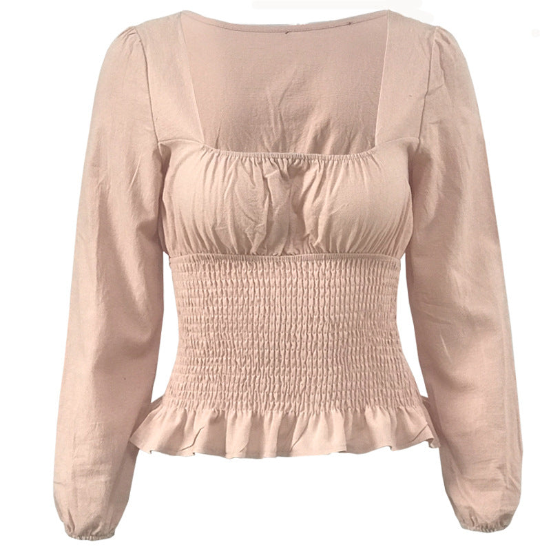 Damebluse med elastisk nederkant og fine flæsedetaljer Stilla