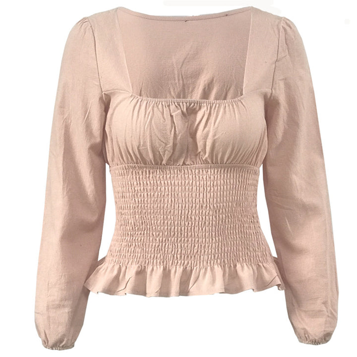 Damebluse med elastisk nederkant og fine flæsedetaljer Stilla