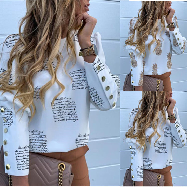 Dame mode bluse med ananasmotiv og elegante knapdetaljer Stilla