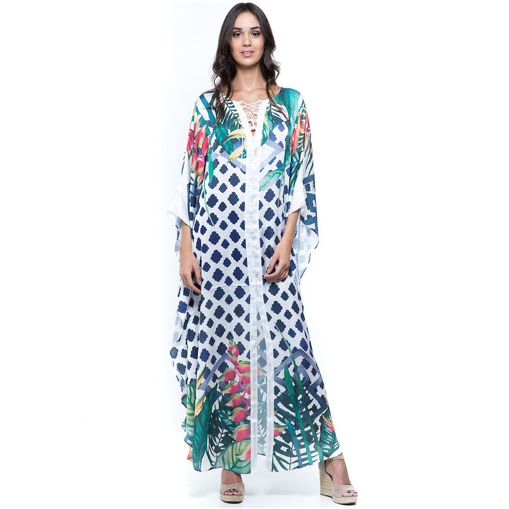 Dame Strandkaftan med farverigt blomstertryk og luftig silhuet Stilla