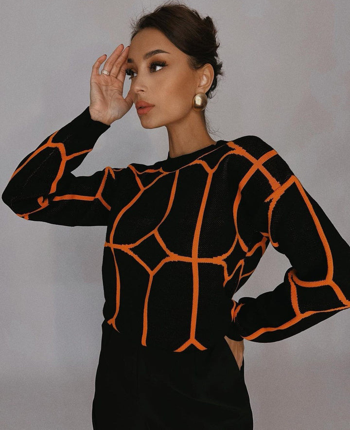 Stilla | Bluse i geometrisk farve-strik