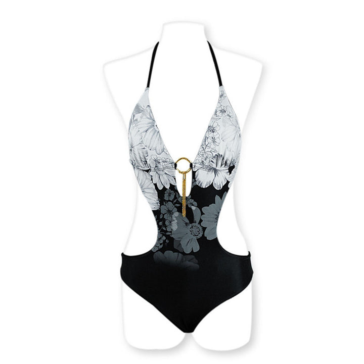 Dame éndelt badedragt med floral cut-out design og dekorativ nøglehænger Stilla