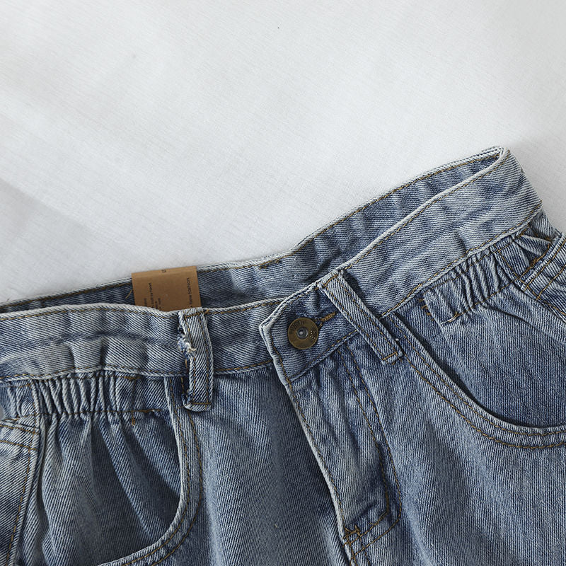 Kvinders højtaljede denimshorts med omskiftelig kant og elastisk talje Skovae