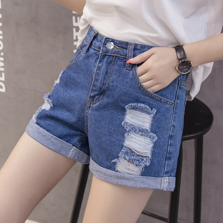 Kvindes denimshorts med trendy slidte design og afslappet opbukning