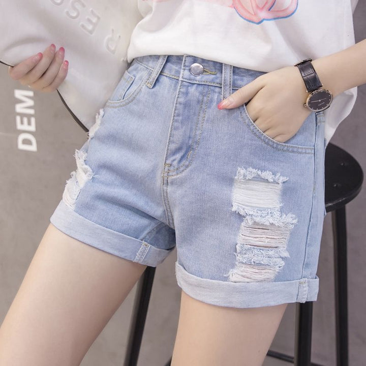 Kvindes denimshorts med trendy slidte design og afslappet opbukning