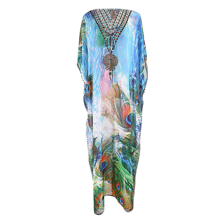 Dame Strandkimono med kunstnerisk påfuglemotiv og elegante accenter Stilla