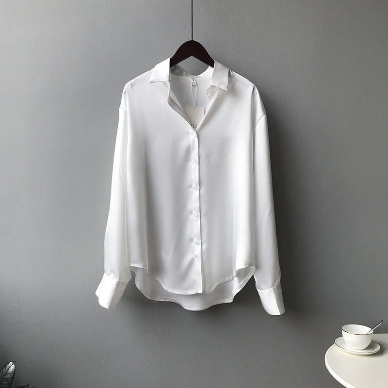 Dame silkebluse med elegante knapdetaljer Stilla