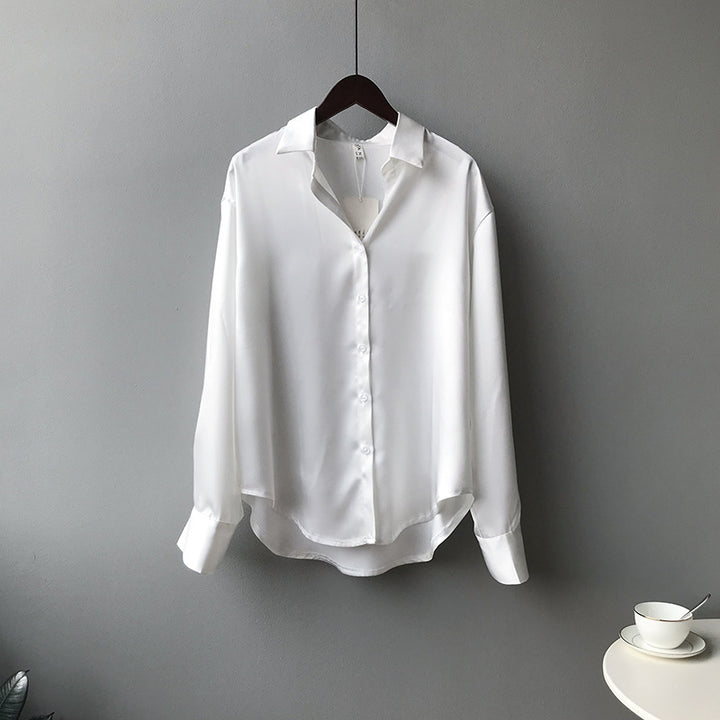 Dame silkebluse med elegante knapdetaljer Stilla