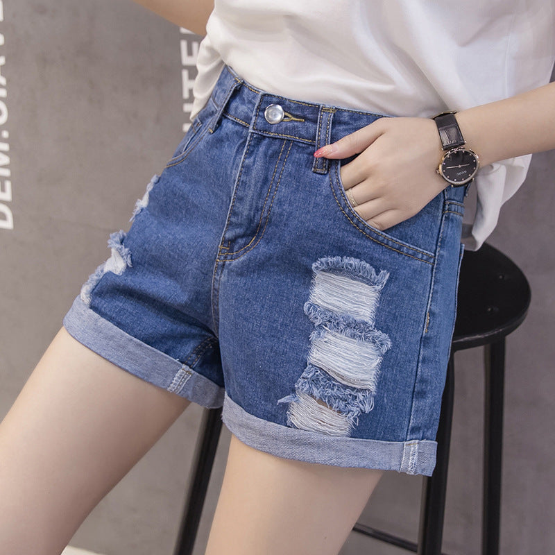 Kvindes denimshorts med trendy slidte design og afslappet opbukning