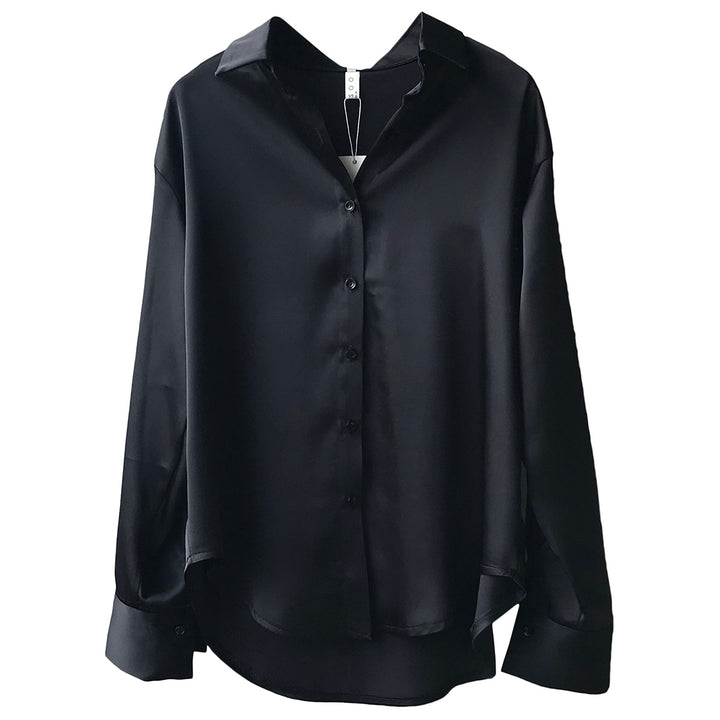 Dame silkebluse med elegante knapdetaljer Stilla