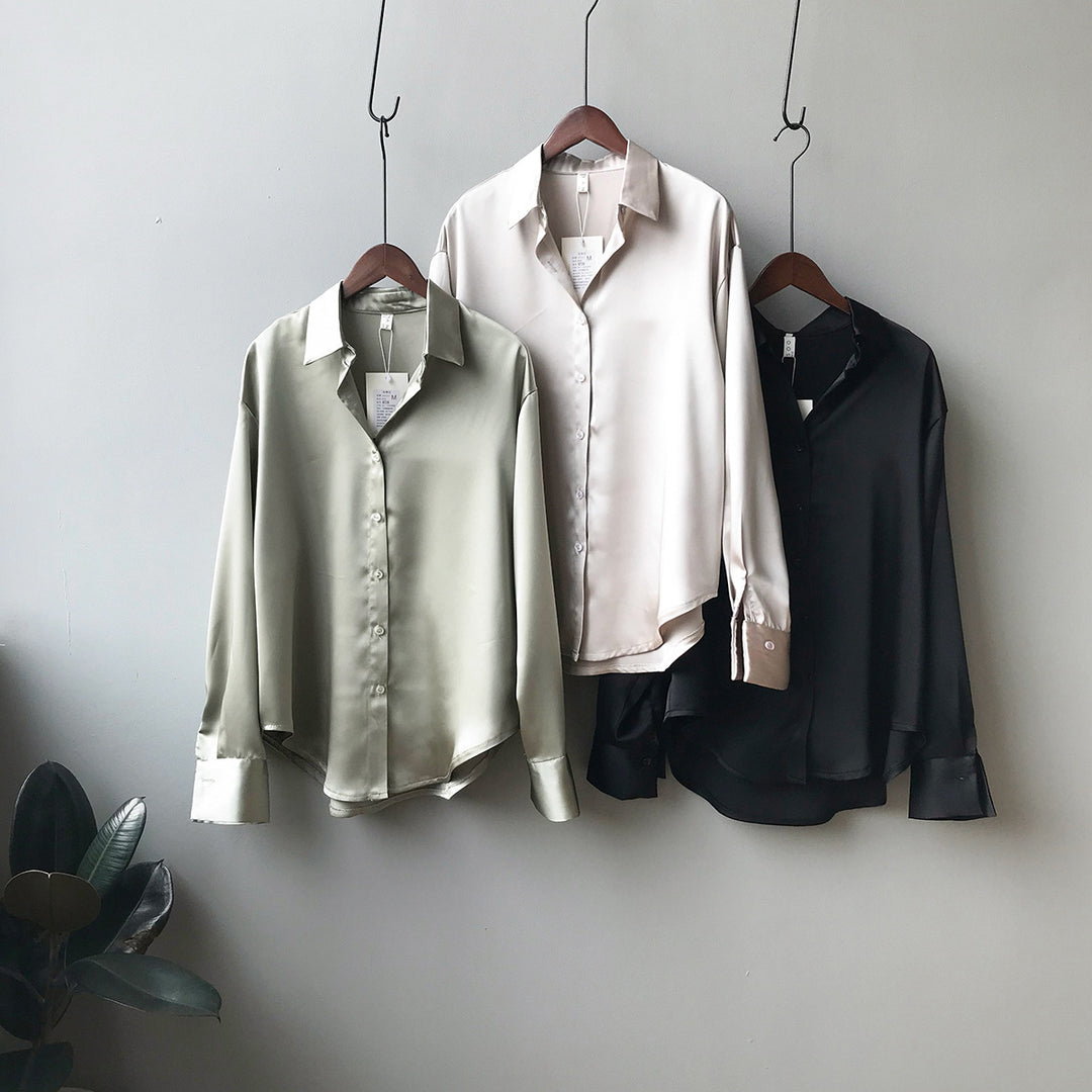 Dame silkebluse med elegante knapdetaljer Stilla