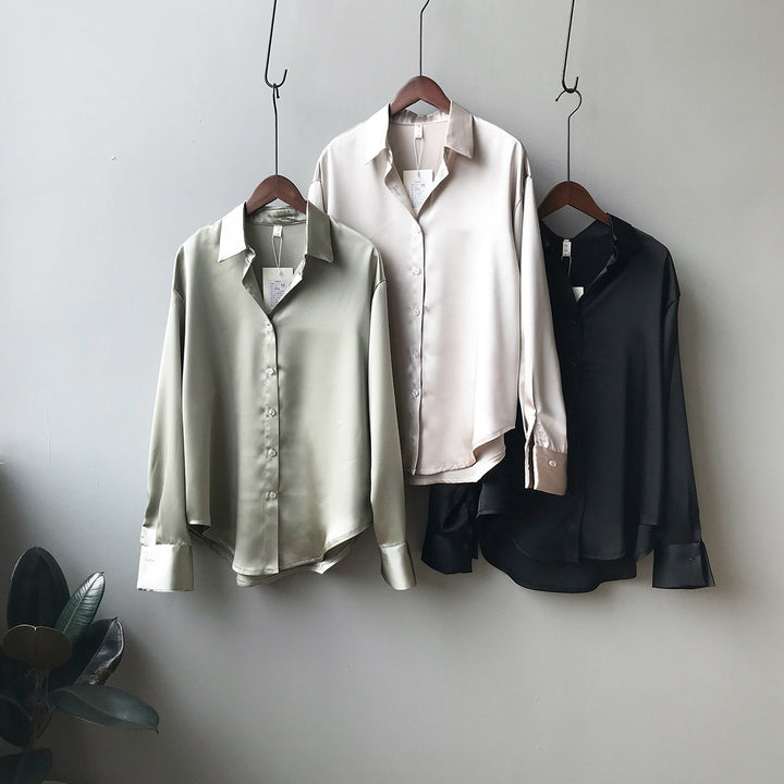 Dame silkebluse med elegante knapdetaljer Stilla