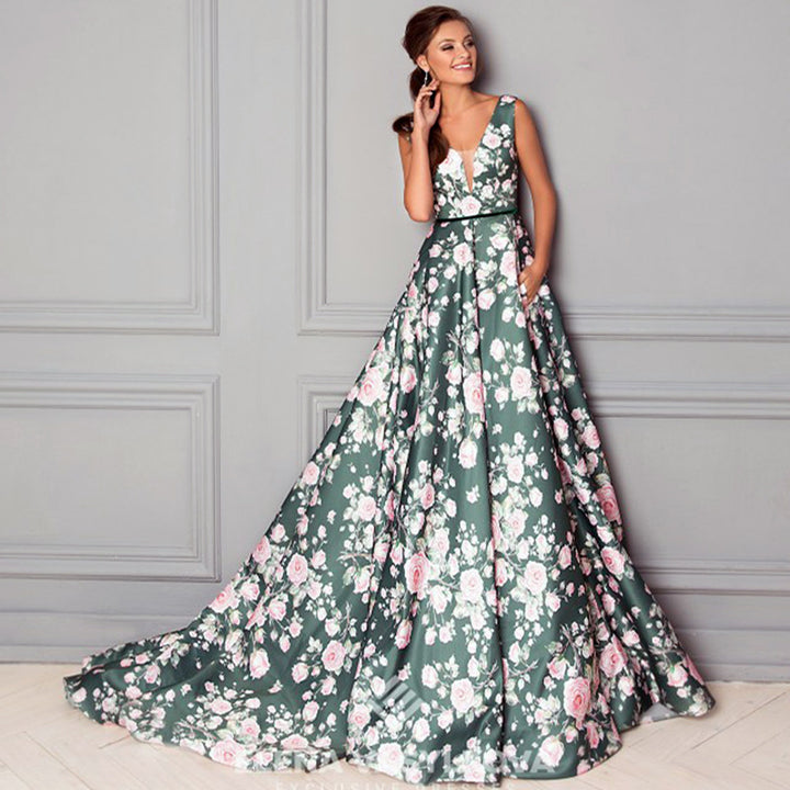 Dame maxikjole med elegant floral print og svingende kant Stilla