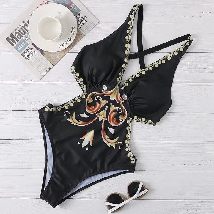 Dame one-piece badedragt med kunstnerisk design og justerbare stropper Skovae