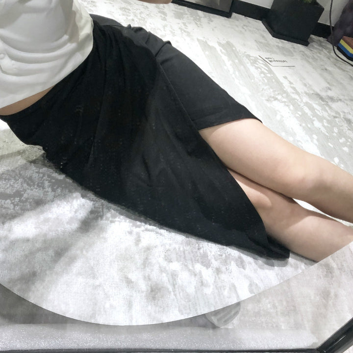 Dame indpakningsskørt med elegant drapering og asymmetrisk kant Stilla