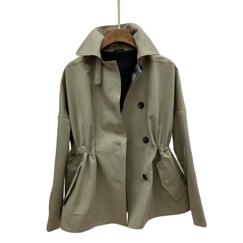 Dame trenchcoat med fashionable accenter og justerbart taljebånd Stilla