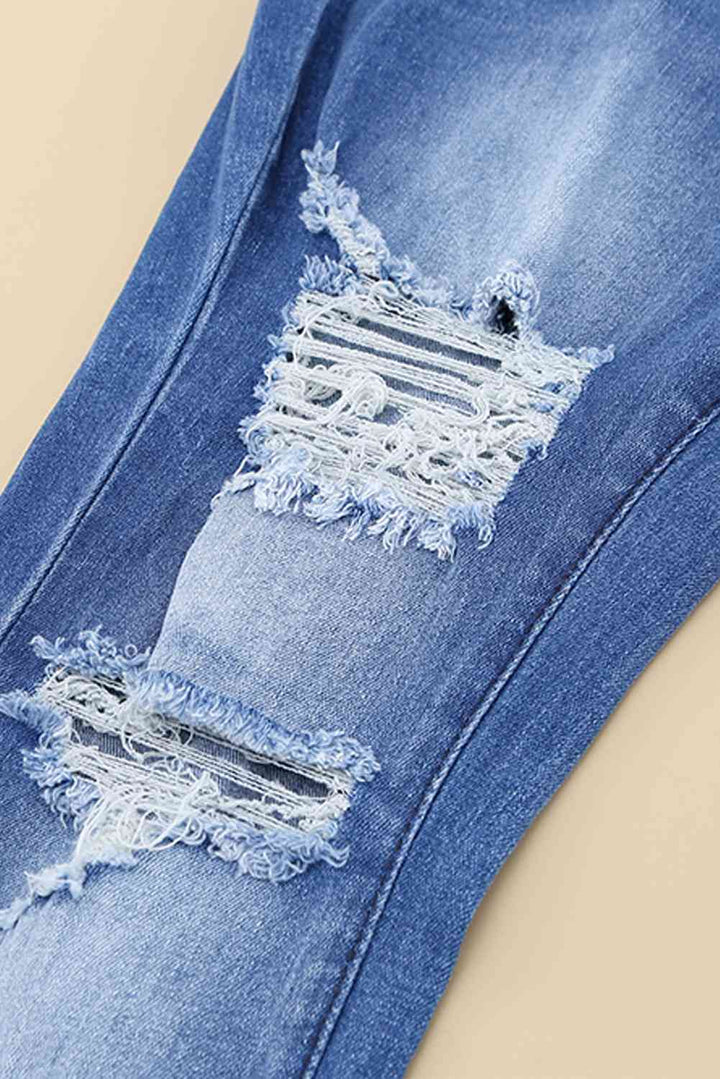 Stilla | Distressed Flare Leg Jeans Med Lommer