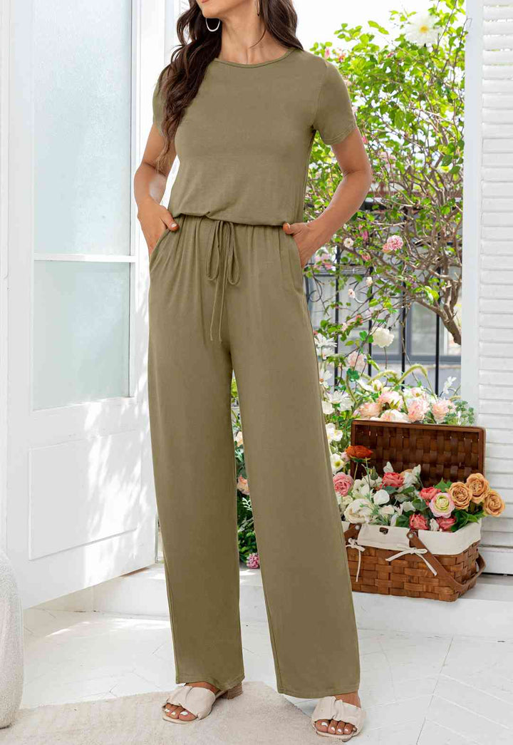 Stilla | Hals Åben Bag Jumpsuit Med Lommer