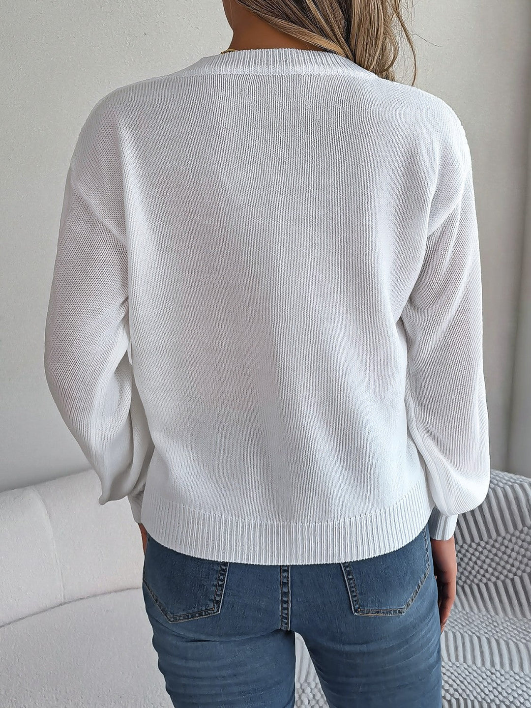 Stilla | Strikket V-hals lanterneærme sweater