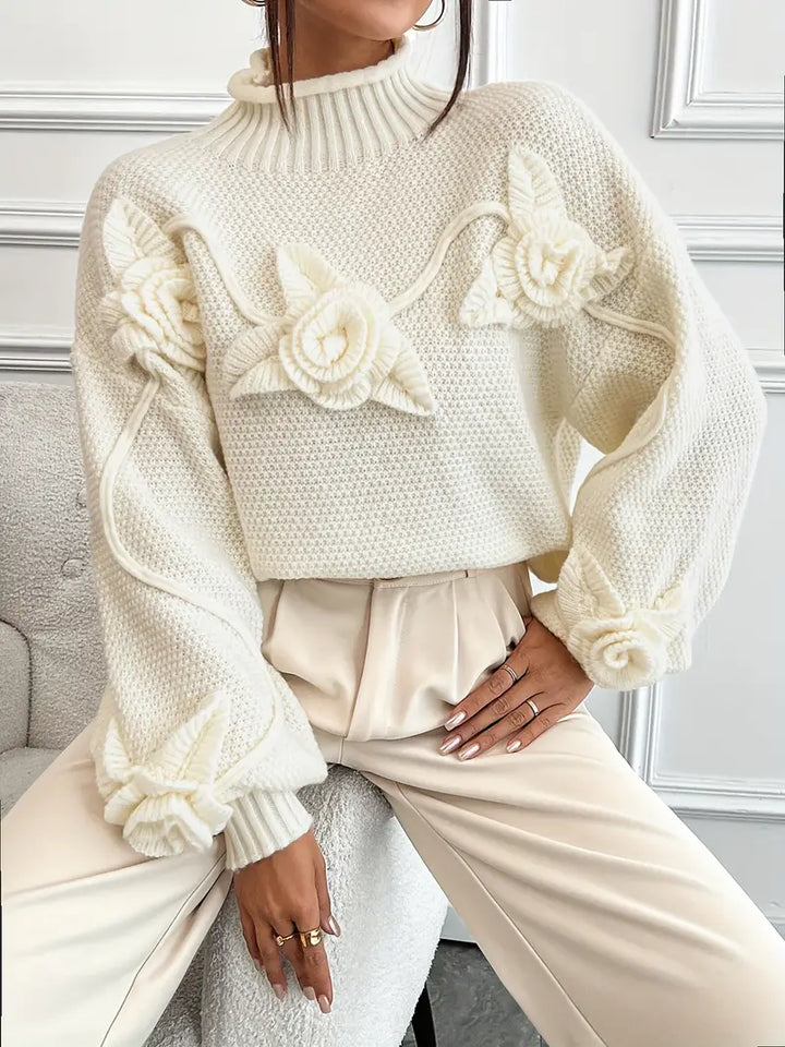 Stilla | Rullekrave strikbluse med blomster