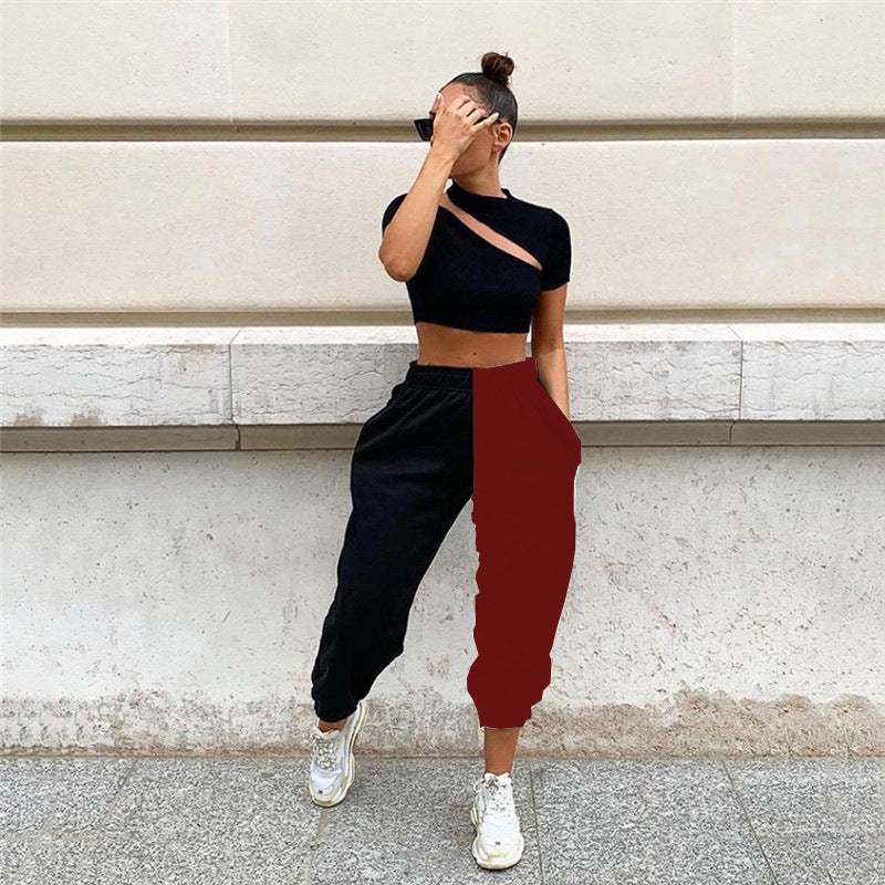 Dame Sporty Crop-Top med asymmetrisk snit og afslappede joggingbukser Stilla