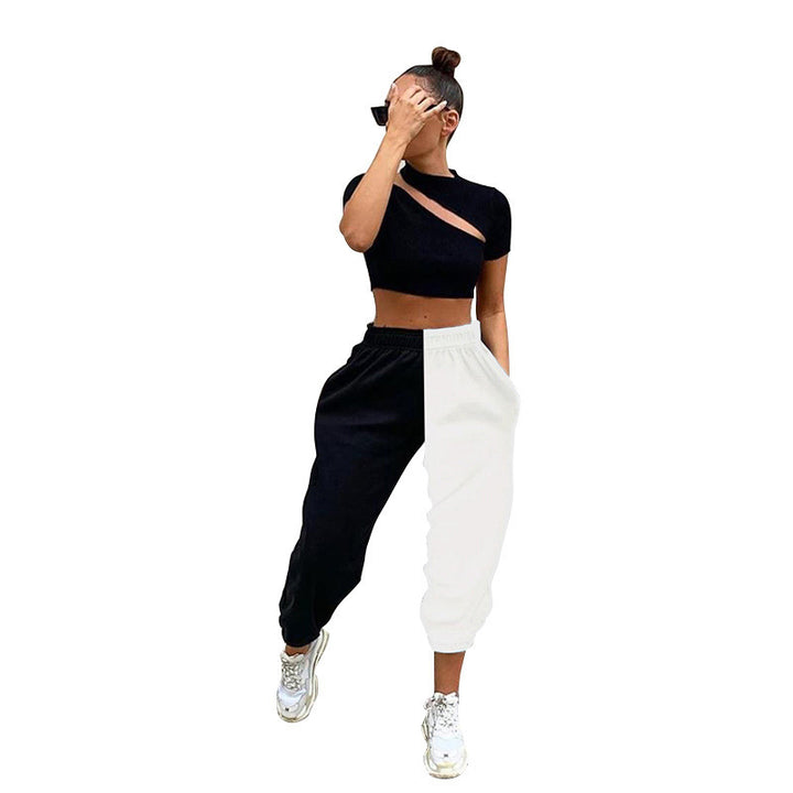 Dame Sporty Crop-Top med asymmetrisk snit og afslappede joggingbukser Stilla