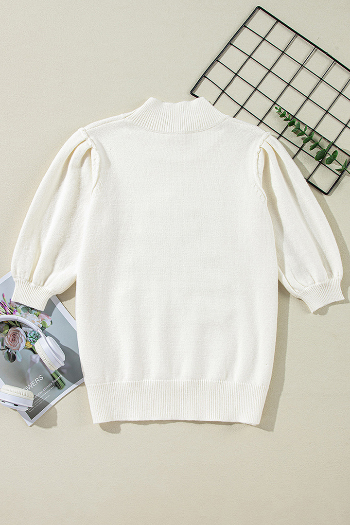 Stilla | Løs rullekrave sweater med patchwork af juletræ pailletter
