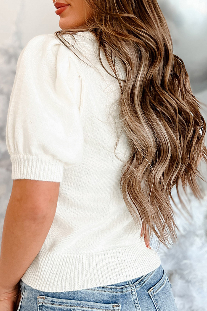 Stilla | Løs rullekrave sweater med patchwork af juletræ pailletter