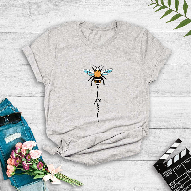 Dame T-shirt med kreativ bi-design Stilla