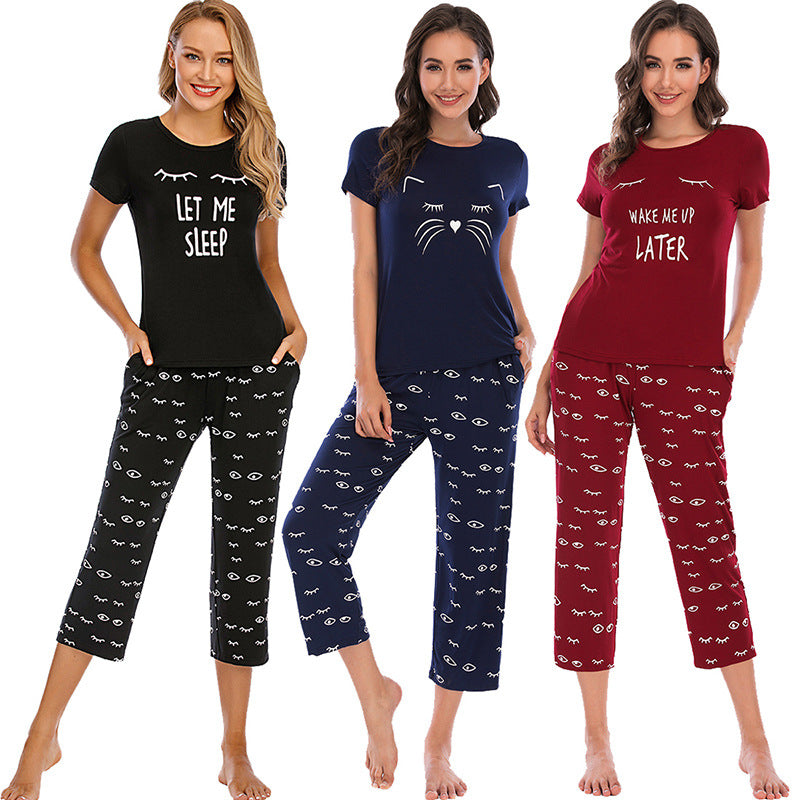 Dame pyjamasæt med sjov kattemotiv Stilla
