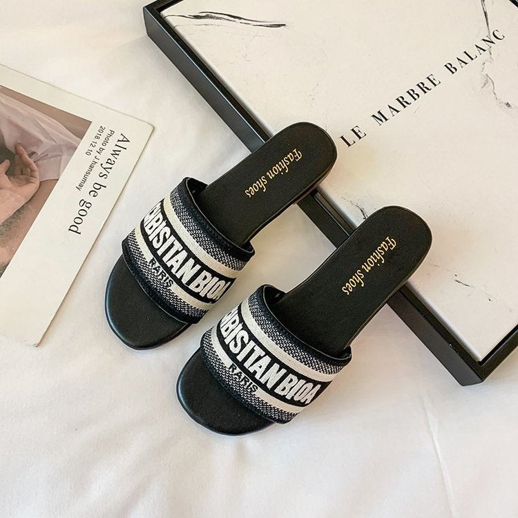 Dame slides med moderne logo-design og komfortabel sål Stilla