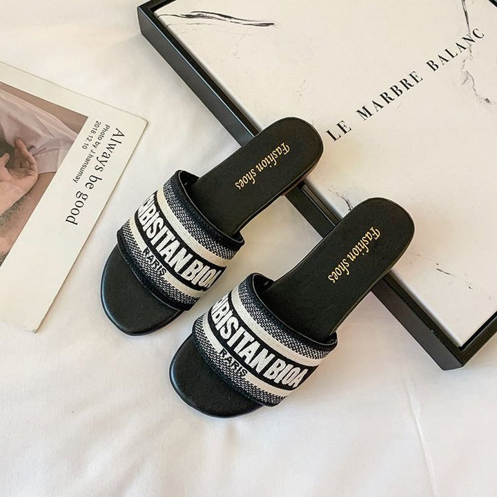 Dame slides med moderne logo-design og komfortabel sål Stilla
