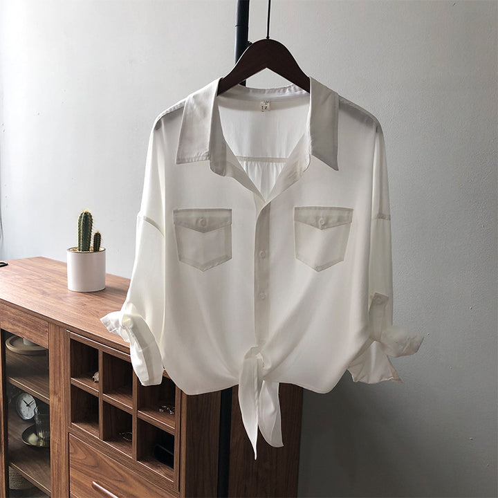 Damer elegant bluse med bundet kant og praktiske brystlommer Stilla